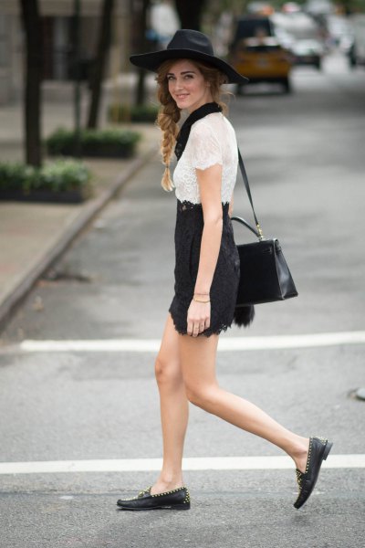 white lace top with black high-rise mini skirt and casual shoes
