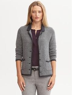 gray jacket with black blouse and wool trousers