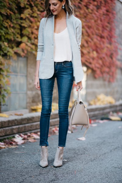 light gray blazer with white top with shoe neck and cropped jeans
