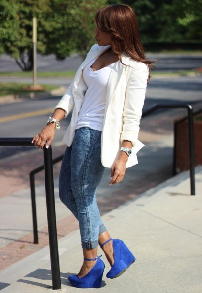 white blazer with v-shirt and gray jeans