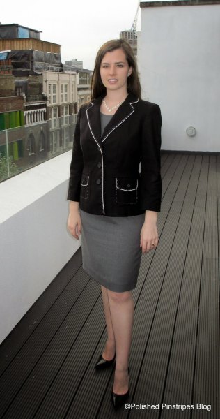 black blazer with gray top and matching pencil skirt