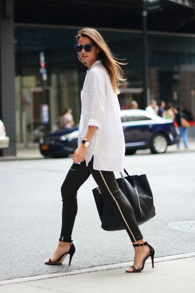 white oversized button up shirt with leather leggings and heels