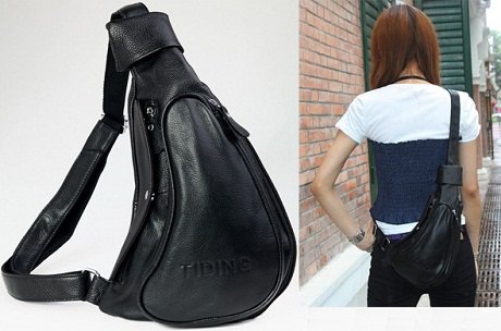 black leather bag with white and navy blue tee and jeans