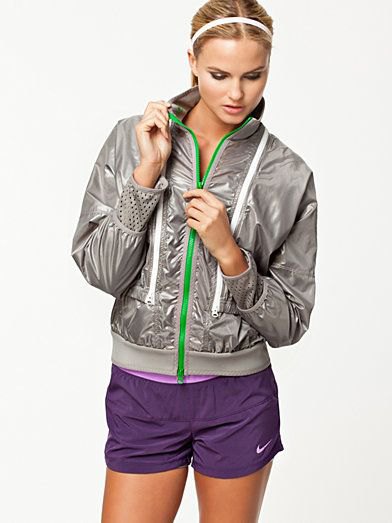 gray quilted nylon jacket with purple jogging shorts