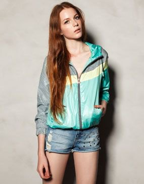 gray and light yellow jacket with mini shorts in denim