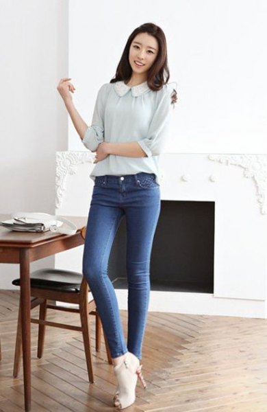 light pink rounded collar blouse with blue jeans