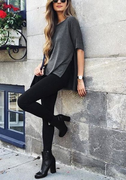 gray side slit shirt with black skinny jeans and ankle boots