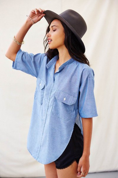 light blue half-heated chambray side slit button up shirt with black mini shorts