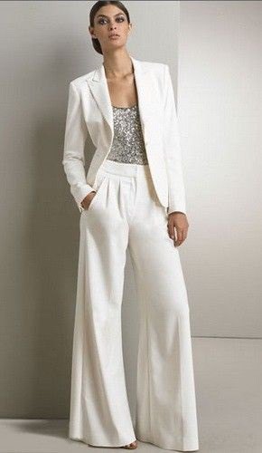 silver top with white blazer and matching flared pants