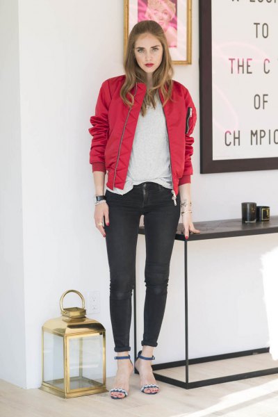 red bomber jacket with white tee and black cuffed skinny jeans