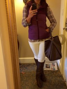 hood purple puffer vest with checkered shirt and white jeans