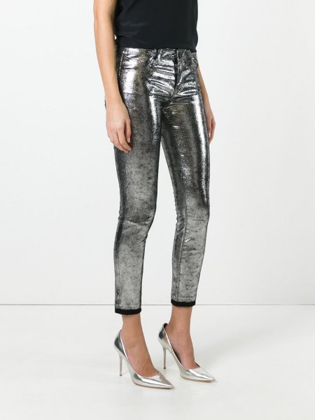 shiny, edged jeans with black sleeveless top