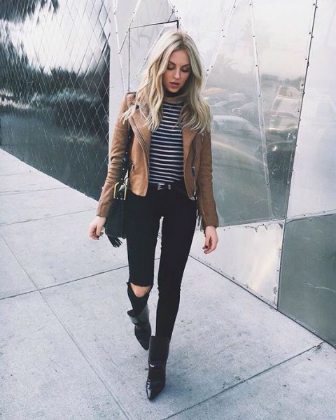 brown jacket with striped long-sleeved t-shirt and black ripped jeans