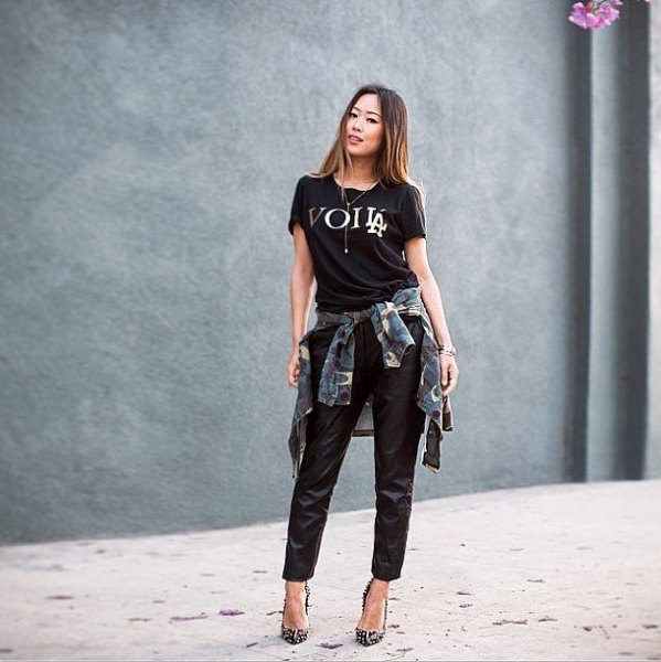black print tee with leather pants and checkered boyfriend shirt