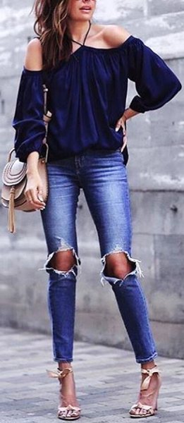 navy blue from the shoulder blouse with ripped skinny jeans