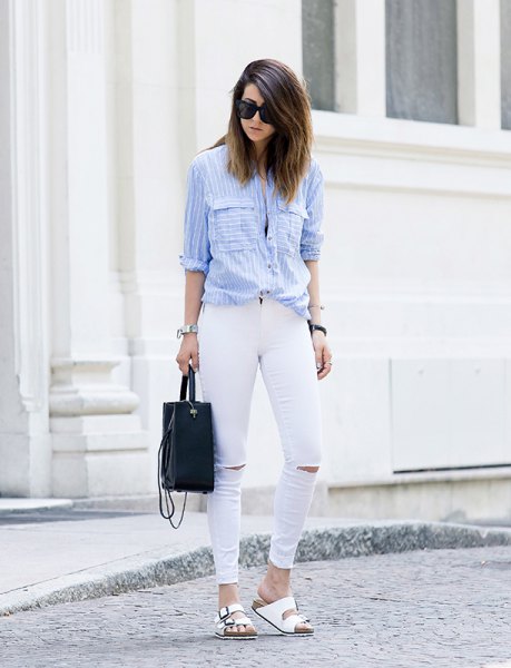 light blue and white striped button up shirt with ripped jeans