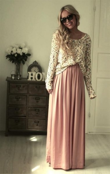 white patterned sweater with pink maxi skirt