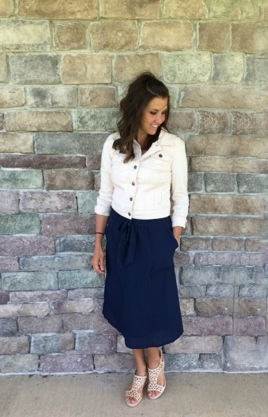 white denim button jacket with navy blue midi casual fit skirt