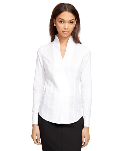 white mock neck collar smaller mini v neck shirt with black skirt