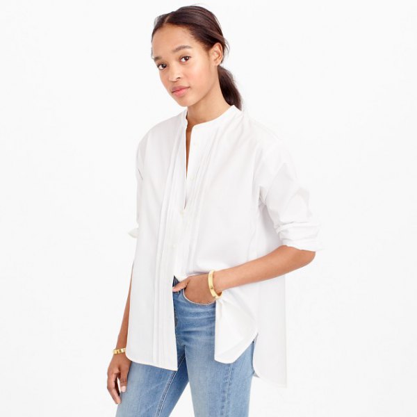 white half-warm large collar smaller shirt with blue jeans