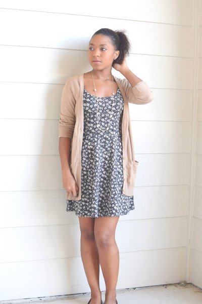 gray and white floral mini-swing dress with ivory cardigan