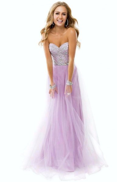sweetheart fit and flare floor-length tulle dress with silver sequin cuff bracelet