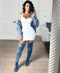 white bodycon mini dress with scoop neck with denim jacket and open toe boots