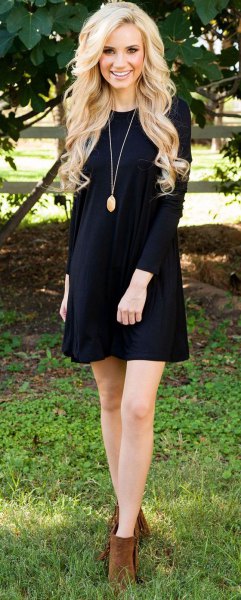 black long-sleeved mini-swing dress with camel heels