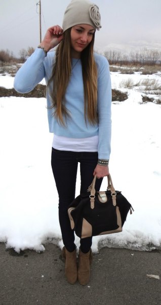 light blue cropped sweater with long white t-shirt