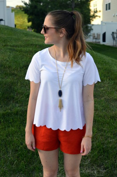 white peeled t-shirt with red mini shorts