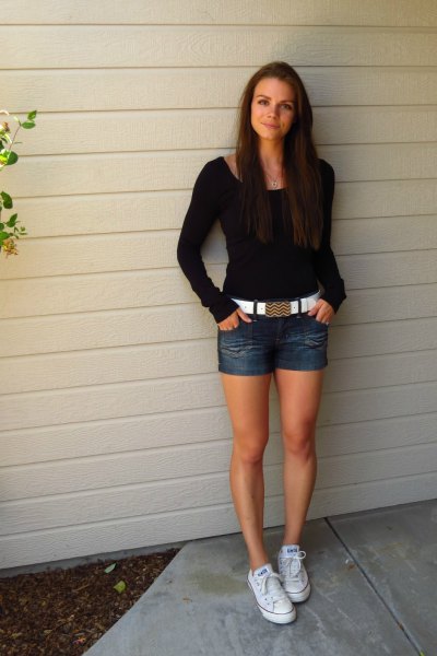 black shaped sweater with denim shorts and white belt