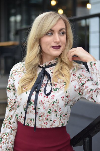 white floral blouse with black ribbon bow