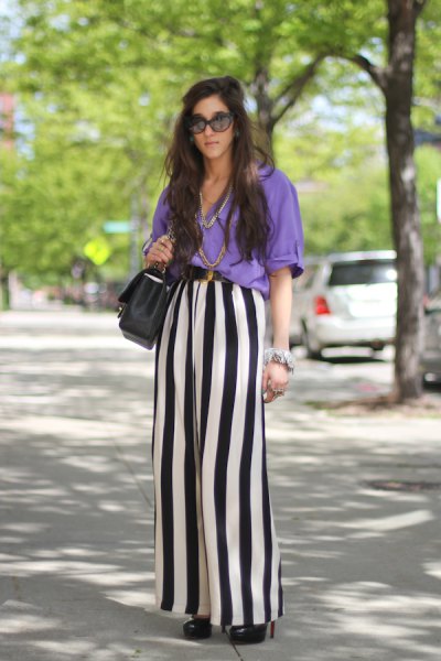 sky blue blouse with black and white striped trousers