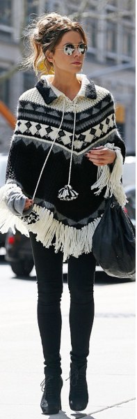 stem printed fringed poncho shirt with skinny jeans