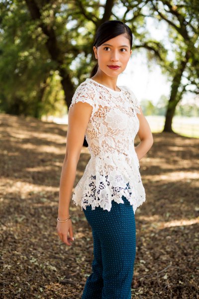 white cap in sleeve lace top with blue polka dot cotton pants