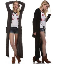 black long cardigan with white print tee and blue denim shorts