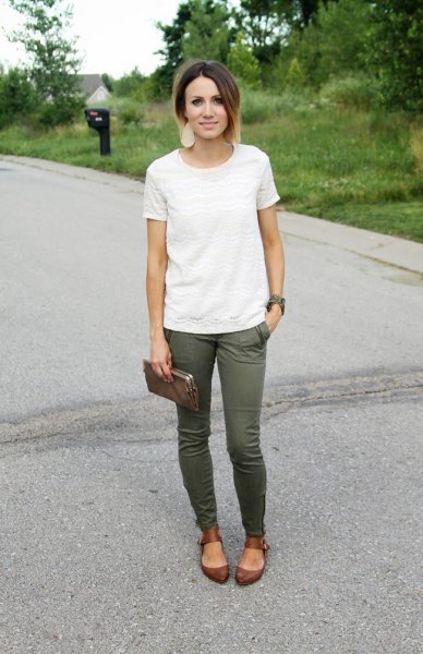 white lace t-shirt with green skinny jeans