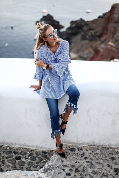 blue and white striped watch sleeve shirt with cropped fringed jeans