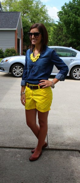 blue chambray button up shirt with yellow shorts