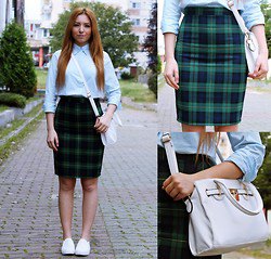 light blue button up shirt with navy and green checkered pencil skirt