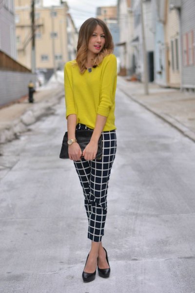 lemon yellow knit sweater with black and white checkered ankle pants