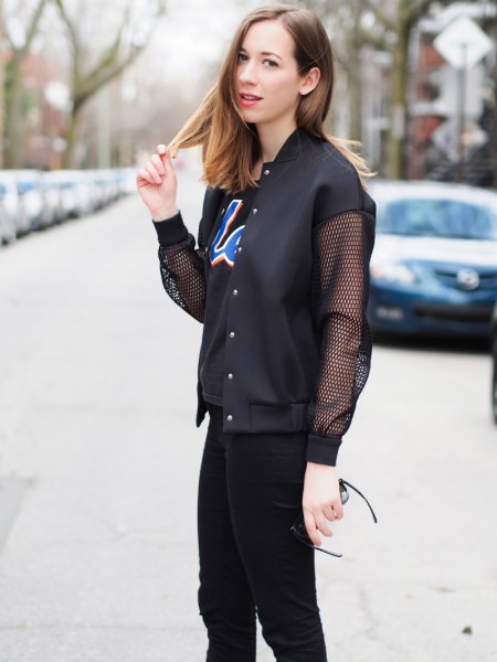 black mesh jacket with print shirt and skinny jeans