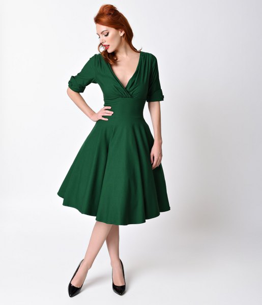 dark green deep v-neck in 1950s style dress