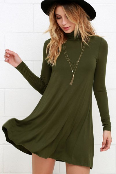 green swing dress with boho style necklace