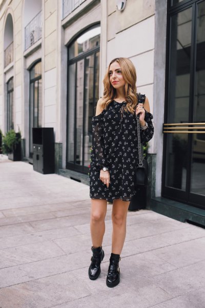 black printed mini dress with leather boots