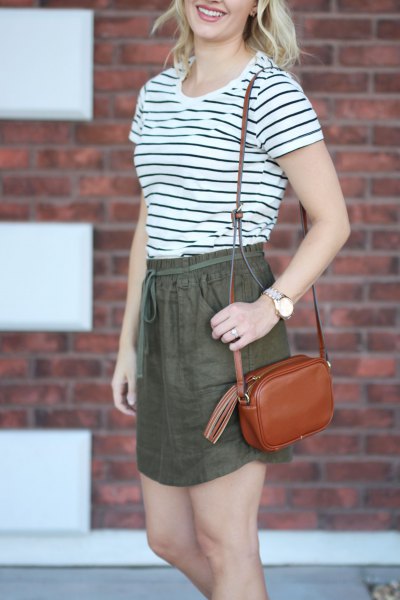 black and white striped t-shirt with green linen elastic waist at the waist