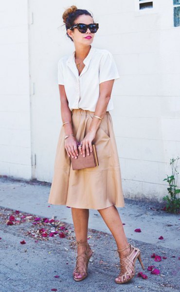 white button up shirt with light pink blown out midi skirt