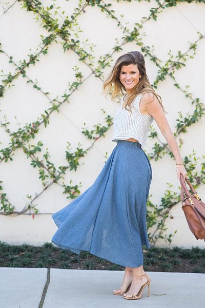 gray sleeveless cropped sweater with blue maxi linen skirt