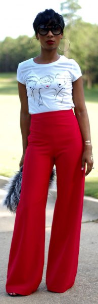white print tee with red wide leg trousers