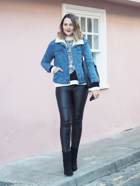 blue denim jacket with white and gray knitted sweater and leather clothes